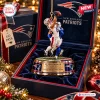 Front view of New England Patriots Efton Chism III Christmas Ornament in a branded display box.
