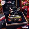 Detailed New England Patriots Malcolm Butler Christmas Ornament in a branded display box.