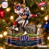 Closeup of New York Giants Super Bowl XLII Christmas Ornament depicting the famous helmet catch over a defender.