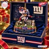 Close-up view of a New York Giants Super Bowl XLII Christmas ornament in a velvet box.