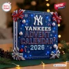 Front view of a blue holiday New York Yankees 2026 Advent Calendar decorated with bows.