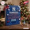Front view of blue New York Yankees 2026 Advent Calendar box decorated with baseball graphics and holiday ornaments.