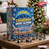 Front view of an NFL Los Angeles Chargers advent calendar box with miniature figurines on a wooden table.