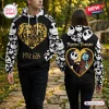 Front and back view of two people wearing matching black hoodies with skull prints and a gold heart graphic.