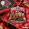 Closeup of Ohio State Buckeyes National Champions Christmas Ornament in red gift box.