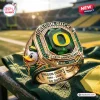 Closeup of the Oregon Ducks 132nd Anniversary 1894-2026 Ring featuring a large green gemstone and duck mascot.