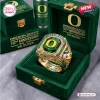 Closeup of the Oregon Ducks 132nd Anniversary 1894-2026 Ring displayed in a green velvet box.