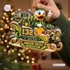 Closeup of the Oregon Ducks 132nd Anniversary Sleigh Ornament held in hand.