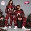 Front view of two models wearing the Ozzy Osbourne Crazy Train Christmas Sweater and Jogger Set in a holiday setting.
