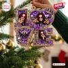 Close-up view of a purple and gold Christmas ornament featuring multiple photos and gothic motifs.
