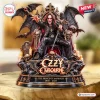 Front view of the Ozzy Osbourne figurine seated on a gothic bat throne with skulls and candles.