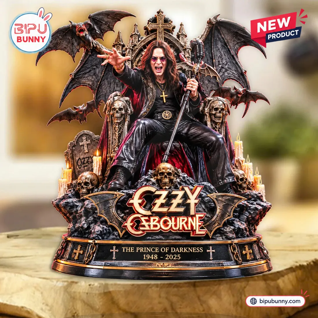 Front view of the Ozzy Osbourne figurine seated on a gothic bat throne with skulls and candles.