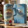 Front view of Peanuts 77th Anniversary YETI Handle Tumbler with Snoopy graphic and blue box.
