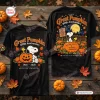 Front and back view of the Peanuts Great Pumpkin 60th Anniversary Shirt on wooden table with autumn leaves.