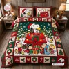 Front view of Peanuts Snoopy Christmas Quilt Bedding Set featuring cartoon characters and holiday motifs.
