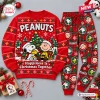 Front view of Peanuts Snoopy Christmas Sweater and Jogger Pants Set with red pullover and plaid bottoms.