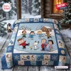 Front view of Peanuts Winter Skating Friends Bedding Set outdoors in snow.