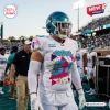 Football player wearing a Coastal Carolina Chanticleers 2026 football jersey on a stadium field.