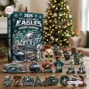 Front view of a Philadelphia Eagles 2026 Advent Calendar surrounded by team-themed figurines and holiday decorations.