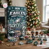 Front view of Philadelphia Eagles 2026 Advent Calendar box with football figurines and holiday decor on a wooden table.