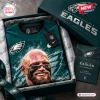 Front view of Philadelphia Eagles Lane Johnson football shirt packaged inside a branded team box.