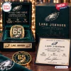 Philadelphia Eagles Lane Johnson championship ring displayed inside an open green velvet box with certificate.