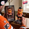Front view of Philadelphia Flyers Gritty 60th Anniversary Vinyl Figure beside packaging box.