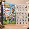 Front view of Phineas and Ferb Advent Calendar Blind Box next to a plastic tray with 24 numbered ornament compartments.