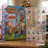 Front view of Phineas and Ferb Advent Calendar Blind Box alongside a plastic tray of miniature holiday ornaments.