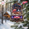 Front view of a bell shaped Pink Floyd Christmas ornament featuring band imagery and snowy pine tree background.
