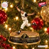 Hanging figurine of a baseball player in vintage uniform on a commemorative base.