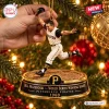Hand holding a Pittsburgh Pirates Bill Mazeroski Christmas Ornament on a tree.