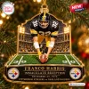 Front view of a Pittsburgh Steelers Franco Harris Christmas Ornament featuring a football player figurine.