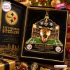 Front view of a Pittsburgh Steelers Franco Harris Christmas ornament in a display box.