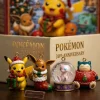 Closeup of Pokémon 30th Anniversary 2026 Advent Calendar figurines including Pikachu, Eevee, Mew, and Snorlax.