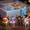 Close-up of five winter-themed figurines with the 2026 advent calendar box behind them.