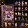 Front view of holiday advent calendar box with miniature ghost and fairy figures displayed on shelves.