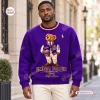 Front view of a purple sweatshirt featuring a teddy bear graphic and the Omega Psi Phi text.