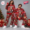 Front view of two models wearing the Post Malone Christmas Sweater And Jogger Pants Set in red with holiday patterns.