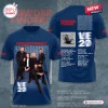 Front and back view of blue Powderfinger Rock Band 2027 Tour Limited Edition Shirt with band photo and tour dates.