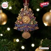 Front view of Queen Elizabeth II Centenary Commemorative Christmas Ornament hanging on a tree.
