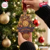 Close-up of a Queen Elizabeth II Centenary Commemorative Christmas Ornament hanging on a tree.