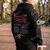 Back view of Queens Of The Stone Age Tour Black Hoodie featuring tour dates and red text.
