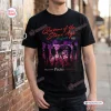 Front view of a Queens Of The Stone Age Tour Black Shirt with purple graphic.
