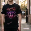 Front view of a Queens Of The Stone Age Tour Black Shirt with red and purple concert graphic.