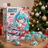 Front view of the Racing Miku Advent Calendar 2026 box with small figures on a wooden table.