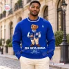 Man wearing a blue Ralph Lauren x Phi Beta Sigma sweatshirt with a teddy bear graphic.
