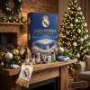 Blue Real Madrid Los Blancos Santiago Bernabeu 2026 Advent Calendar box displayed on a wooden mantle with mini figures.
