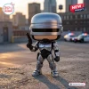 Front view of Robocop OCP Police 001 40th Anniversary Figure holding a pistol outdoors.