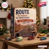Front view of Route 66 100 Years Advent Calendar box with miniature toy vehicles on a wooden table.